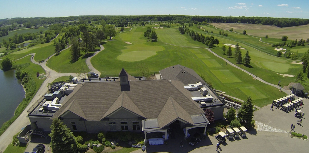 Golf course club house and course aerial photograph